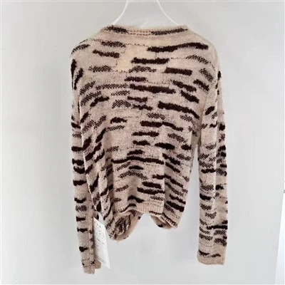 Tops de tricô criados por designers de tricô